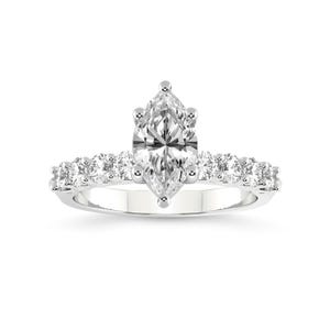 K&ouml;nnte beinhalten: Ein silberner Verlobungsring mit einem Marquise-f&ouml;rmigen Mittelst&uuml;ck und einer Reihe kleiner runder Steine.