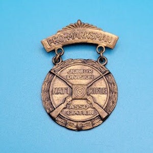 Vintage NRA Junior Division Pro Marksman Badge Pin Brooch National Rifle Association