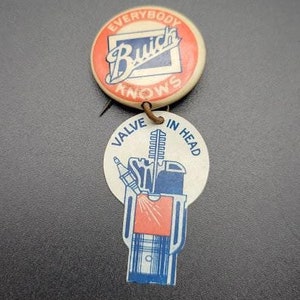 Vintage Buick Advertisement Pin Back Button Valve in Head Lapel Pin