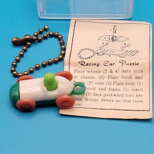 Vintage Racing Car Puzzle Key Chain with Original Instructions