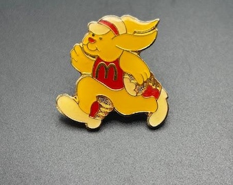 Pin de solapa vintage de McDonald's con forma de conejo corriendo, estilo empleado