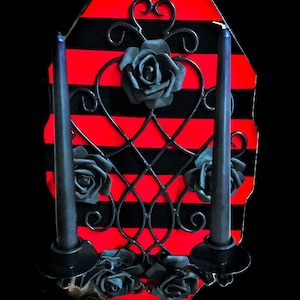 Wall decoration made of solid wood, with wrought iron candle holder in an impressive design