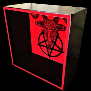 Wooden box shelf with visible grain and decorated with hand-painted velvet