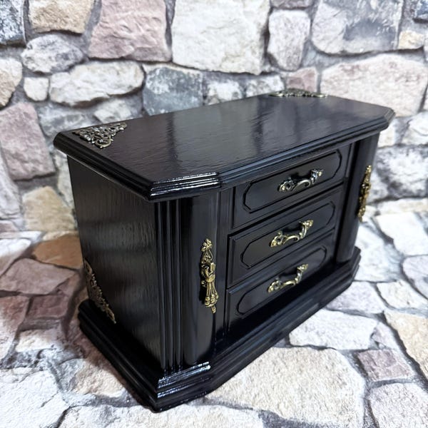 Jewelry cabinet made of solid wood, a vintage piece of furniture in a new, elegant design