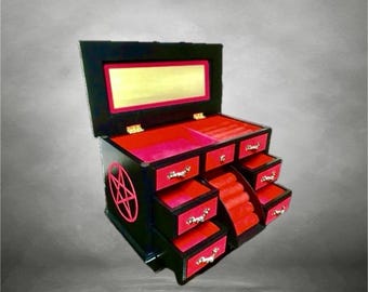 Vintage wooden jewelry cabinet, decorated with red velvet and pentagram