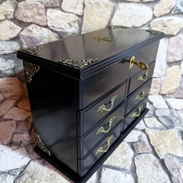Jewelry cabinet made of solid wood, a vintage piece of furniture in a new, elegant design