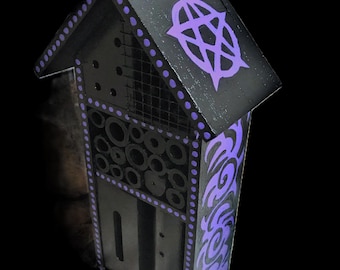 Small wooden insect hotel hand-painted in black and purple, a touch of magic in your garden
