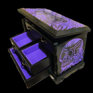 Jewelry cabinet made of solid wood, a vintage piece of furniture in a new shine and hand-painted
