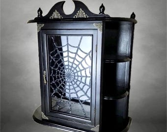 Gothic wooden display cabinet, black vintage furniture with spiderweb