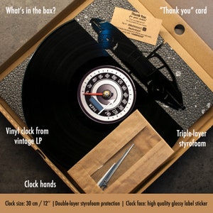 May include: A black vinyl record clock with a speedometer face and clock hands. The clock is packaged in a brown box with a triple-layer styrofoam protection. The box also includes a thank you card.