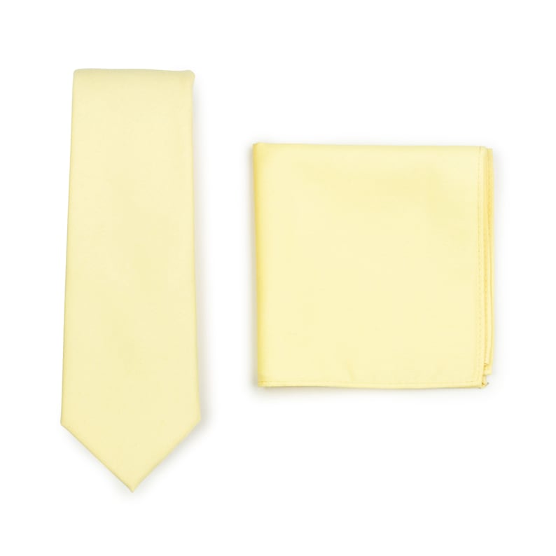 May include: A yellow tie and pocket square set. The tie is a solid color and the pocket square is a solid color.