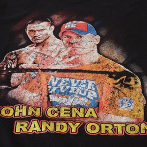 Vintage John Cena Randy Orton WWE Wrestling Black Rap Tee - Medium?