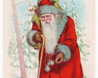 アンティークなサンタクロースのイラストと、作業台に座る