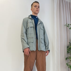 Vintage windbreaker sports shell jacket / Lightwear grey zip up utility outdoor jacket .