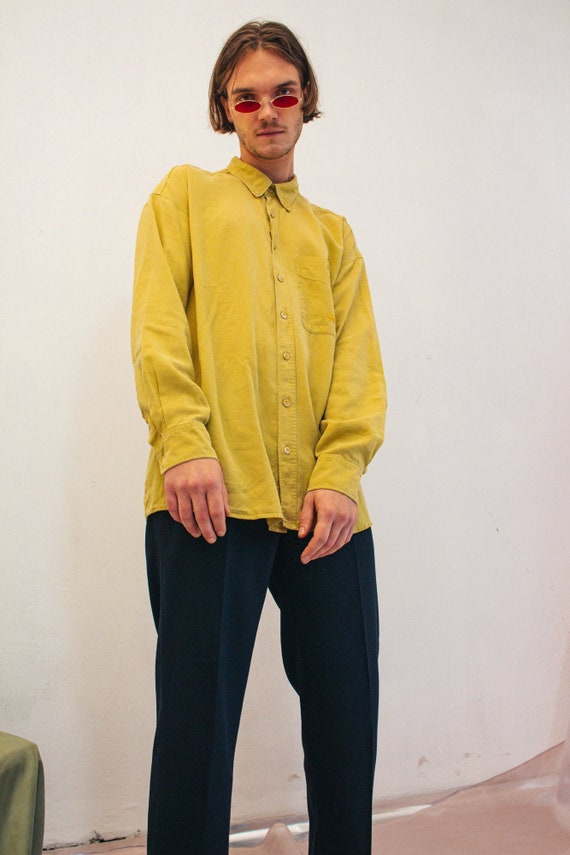 pale yellow long sleeve top