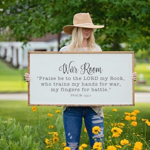 May include: A rustic wooden sign with the text "Welcome to our home" in white lettering. The sign features a distressed finish and a simple, inviting design, perfect for entryway decor.
