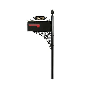 May include: Black mailbox with a red flag and the number 1628 in gold lettering. The mailbox is mounted on a black post with decorative scrollwork and a decorative finial at the top.