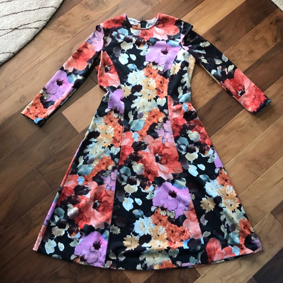 Striking 1970s Goldworm Dress with Floral Design (