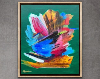 May include: Abstract painting with bold strokes of blue, red, yellow, white, and black on a green background. The painting is framed in a natural wood frame.