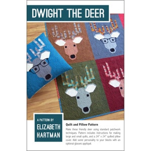 May include: A quilt and pillow pattern featuring a deer with glasses. The pattern is called "Dwight the Deer" and is by Elizabeth Hartman. The pattern includes instructions for making quilts and pillows in various sizes.