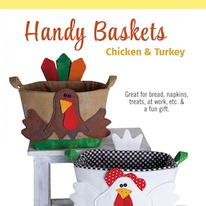 May include: Two fabric storage baskets shaped like a turkey and a chicken. The turkey basket is brown with a green base and the chicken basket is white with a green base and red polka dots. Both baskets measure 6 inches high by 8 inches wide by 8 inches deep. The text "Handy Baskets Chicken & Turkey" is at the top of the image. The text "Cotton Ginnys" is at the bottom of the image.