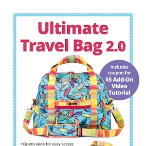 May include: A colorful travel bag with a leaf pattern. The bag has a trolley sleeve, side handles, and an adjustable padded strap. The bag is carry-on compliant. The text "Ultimate Travel Bag 2.0" is at the top of the image. The text "Includes coupon for $5 Add-On Video Tutorial" is in the top right corner of the image. The text "byannie.com ...what's in your bag?" is at the bottom left of the image. The text "The perfect travel companion!" is at the bottom right of the image.
