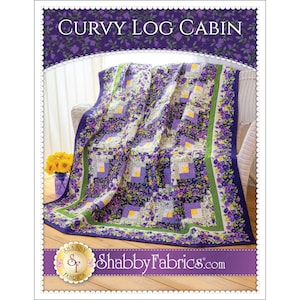 May include: A quilt pattern featuring a log cabin design with a curved border. The quilt is made with purple, green, yellow, and white fabrics. The quilt is displayed on a white wicker chair. The pattern is called "Curvy Log Cabin" and is available from Shabby Fabrics.