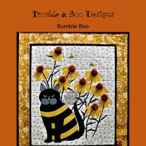 May include: A black cat with yellow stripes sits in a field of yellow flowers with brown centers. The cat is wearing a yellow and black striped vest. The background is a white fabric with a yellow and brown border. The text "Trouble & Boo Designs" and "Bumble Boo" is at the top of the image. The text "Kristadyelle@gmail.com" and "All Rights Reserved" is at the bottom of the image.
