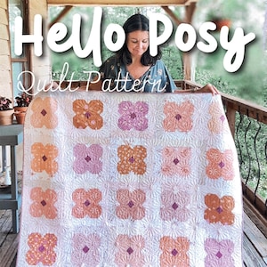 May include: A quilt pattern called "Hello Posy" by Melanie Traylor. The quilt features a floral design in shades of pink, orange, and white. The pattern is available in four sizes: 35" x 48", 60" x 60", 84" x 96". This quilt pattern is for beginners.