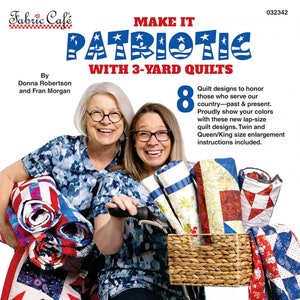 May include: Two women are holding and riding a bicycle with a basket full of red, white, and blue quilts. The title of the book is "Make It Patriotic with 3-Yard Quilts".