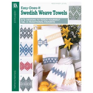 May include: A book titled "Easy-Does-It Swedish Weave Towels" with various towel designs. The cover features a green and white design, with examples of embroidered towels in blue, red, and gray. The book is by Katherine Kennedy.