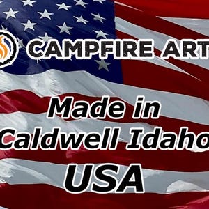 May include: Image features the text "CAMPFIRE ARTS" above "Made in Caldwell Idaho USA" against a backdrop of the American flag. The Campfire Arts logo includes a flame within a circle.