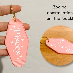 Pink Zodiac Sign Retro Motel Keychain with Constellation on Back - Pink with White Retro Font and Stars and Sparkles