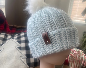 Light Blue Crocheted Beanie With Detachable White PomPom