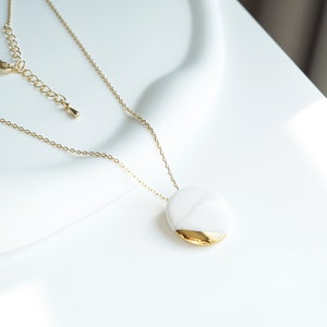 Ceramic gold necklace. Porcelain necklace. Minimalist jewelry. Pebble pendant. Elegant necklace. Wedding jewelry. Bridesmaid gift. Necklace.
