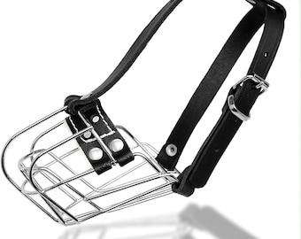 May include: A black leather dog muzzle with a metal cage. The muzzle has a strap that goes around the dog's head and a buckle to secure it.