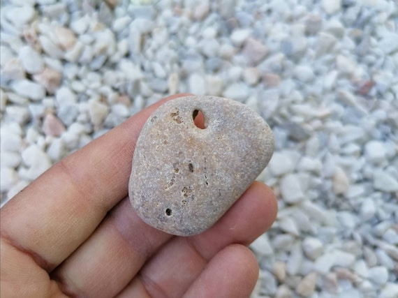Jewelry stones naturally drilled Beach stones for crafts Hag stone Protection charm stone Holey stones Beach stone with natural hole