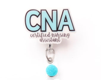 May include: A blue and white badge reel with the text "CNA certified nursing assistant". The badge reel has a blue sparkly button.
