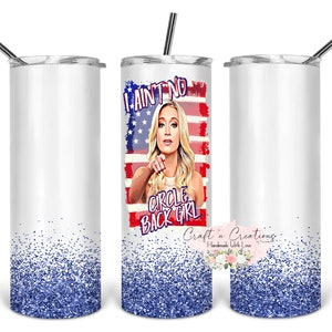 May include: A white tumbler with a blue glitter design at the bottom. The tumbler has a design on the front that says "I ain't no circle back girl" with a picture of a woman in front of an American flag.