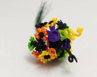Miniature Polymer Clay Purple, Green, Orange, Yellow, and Black Gerbera Daisy Bouquet