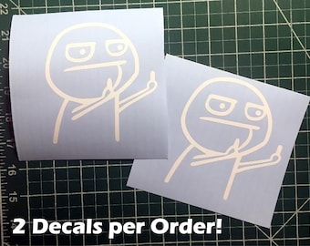 May include: Two white vinyl decals of a stick figure giving the middle finger with a sarcastic expression. The text "2 Decals per Order!" is printed below the decals.