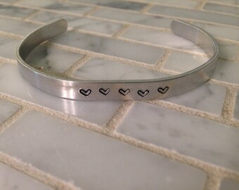 Sneaky Snark hidden message bracelets - cuffs with hidden words