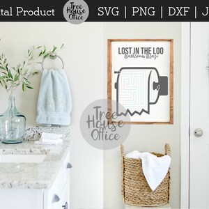 May include: A printable bathroom maze design with a toilet paper roll and the text "Lost in the Loo Bathroom Maze".