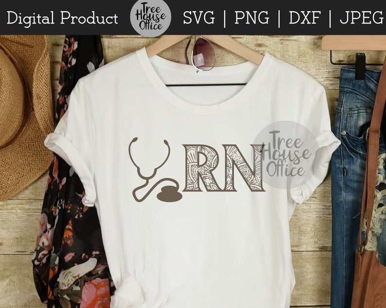 May include: A white t-shirt with a brown graphic of a stethoscope and the letters "RN" with a decorative pattern. The text "Tree House Office" appears twice on the image.