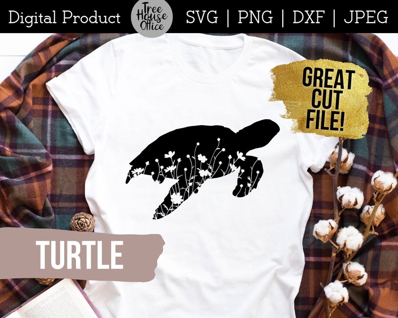 Turtle silhouette with wildflowers inside SVG design shown applied to a white shirt with plaid overshirt