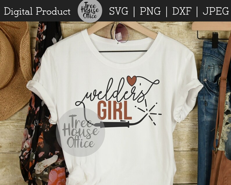 Welders Girl SVG with welding torch shown applied to a white shirt as a finished project idea