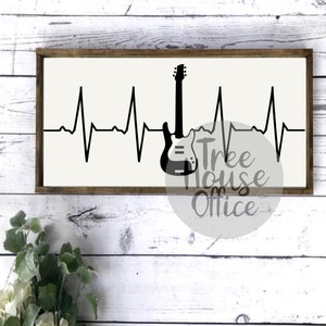Puede incluir: Un letrero en blanco y negro con una guitarra y un gr&aacute;fico de latido del coraz&oacute;n. El letrero dice "Tree House Office".
