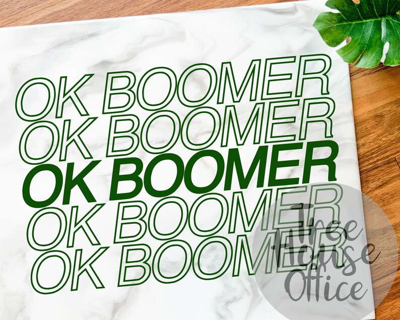 May include: White background with the phrase "OK Boomer" repeated five times in green and black text. The text is outlined in black and the words "OK" are in green.