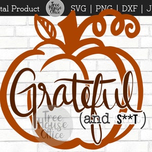 May include: A digital download of a pumpkin-shaped design with the text "Grateful (and s**t)" in brown lettering. The pumpkin is outlined in orange and has a green stem.