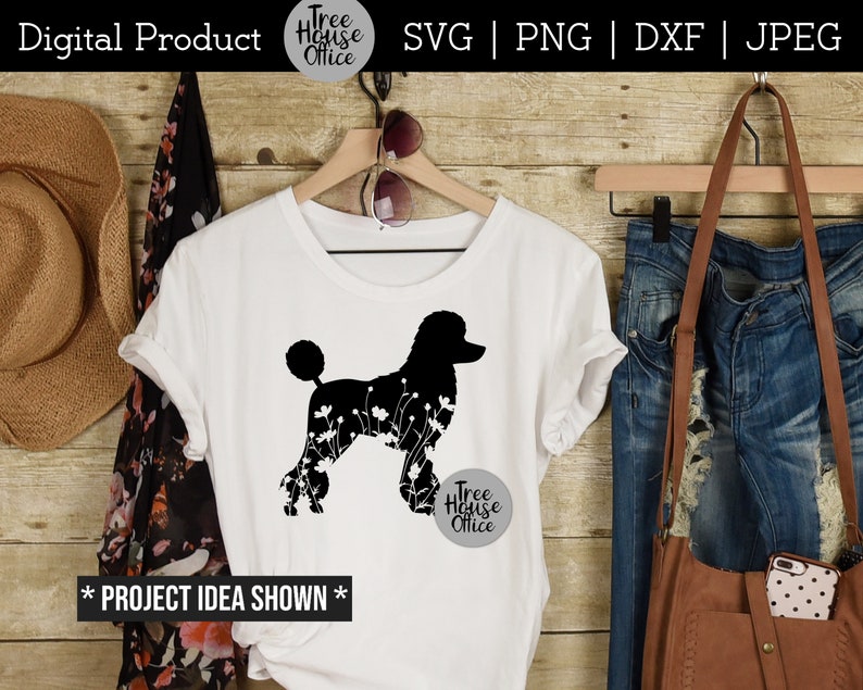 Floral poodle dog silhouette with flowers shown on a womens white shirt with country or western clothing around it.  design features a standard poodle with flowers inside the silhouette